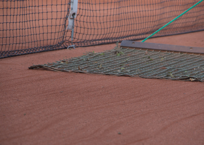 removing debris from the court